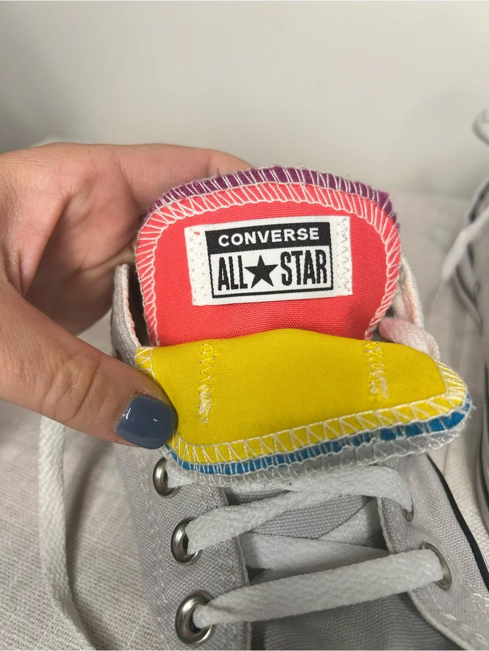Converse Low Top Sneakers in Light Gray with Rainbow Tongue